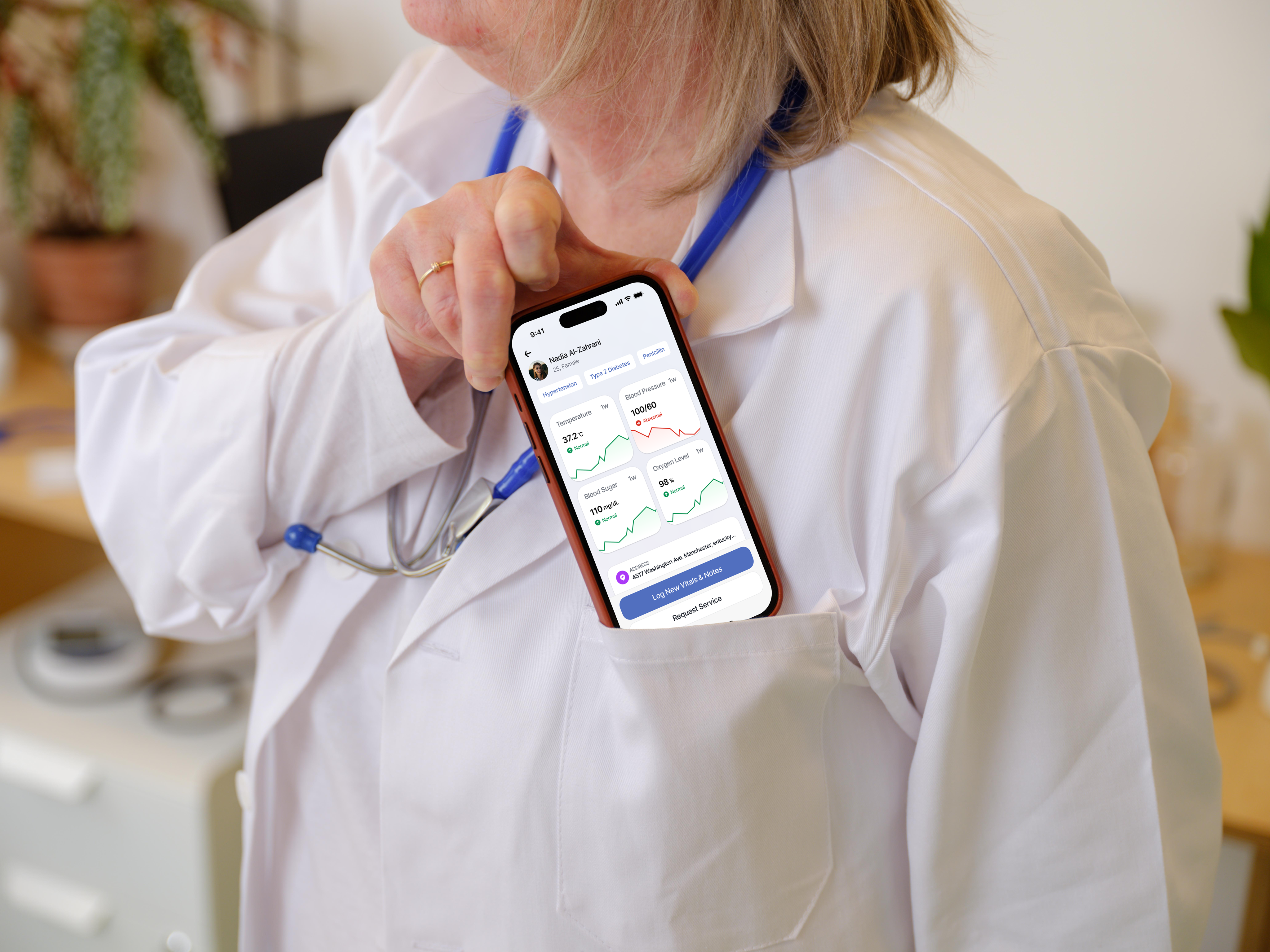 Doctor carrying the patient’s cloud medical record on a mobile device during home care.